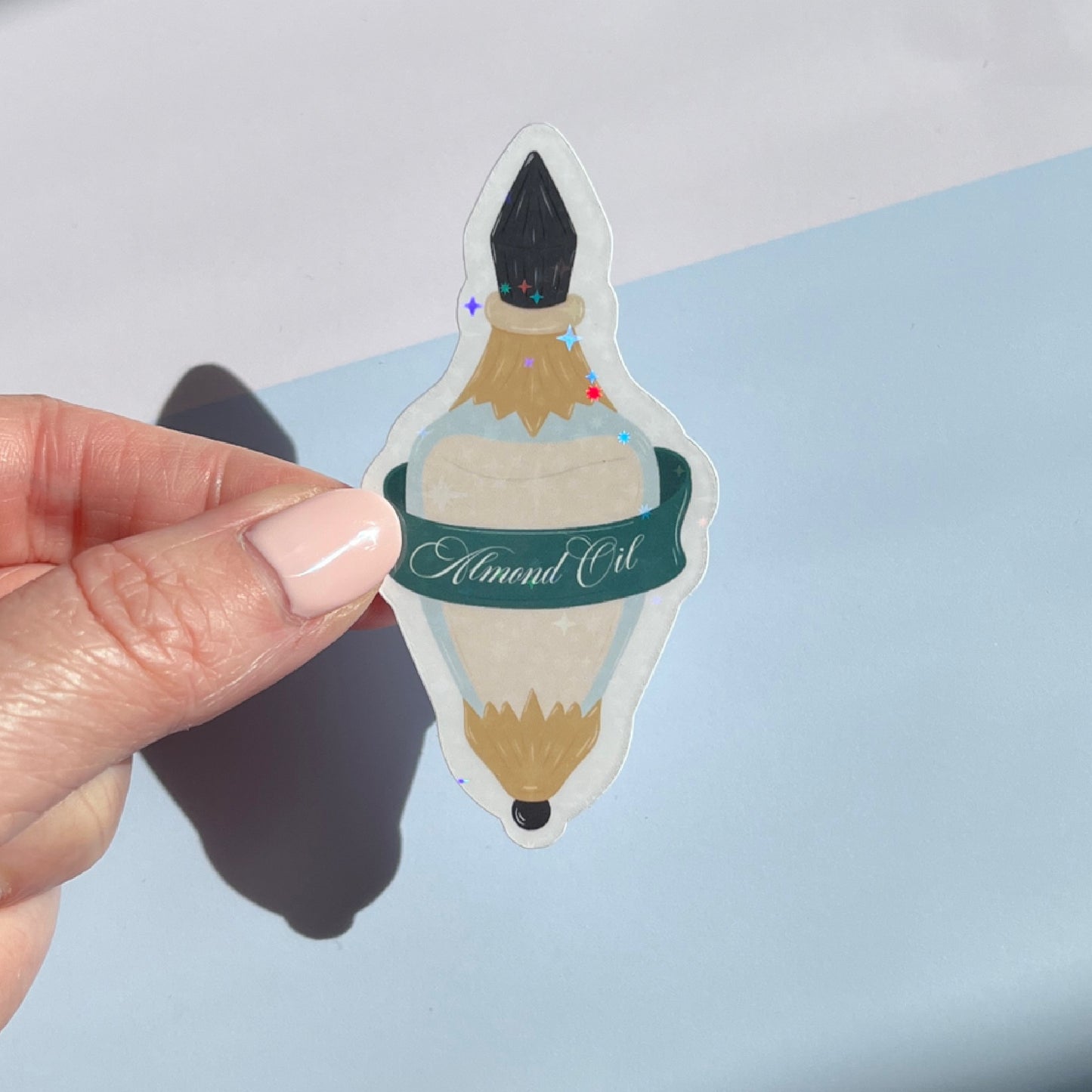 Arobynn Almond Oil Sparkly Vinyl Sticker